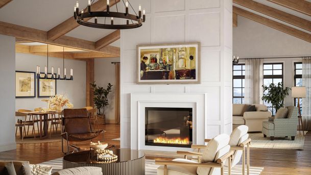 Cozy open-concept living and dining area with a fireplace and wood-beamed ceiling.